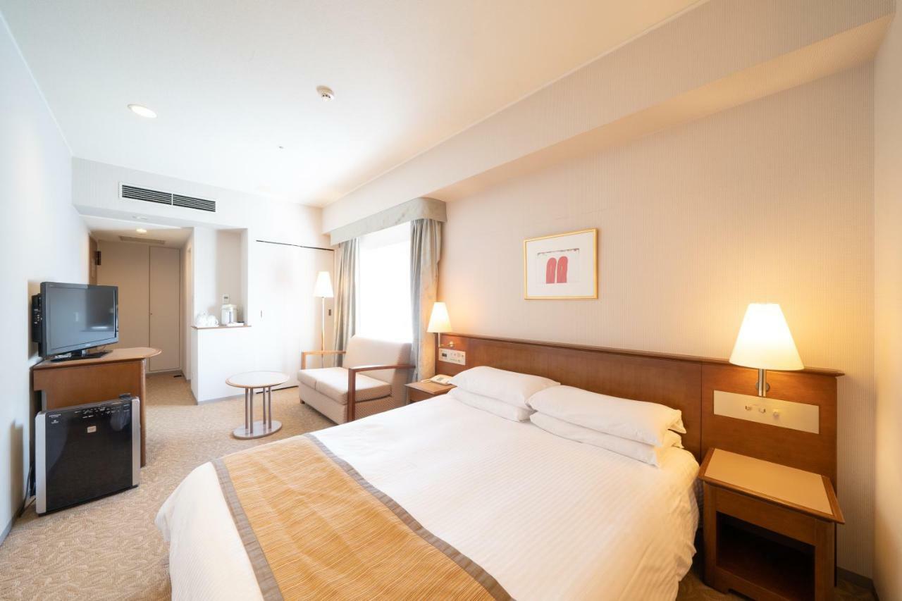 Hotel Terrace The Square Hitachi Bagian luar foto