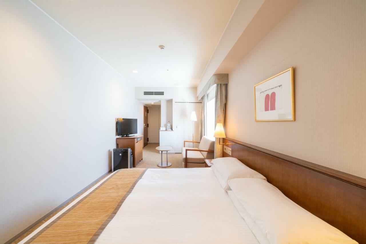 Hotel Terrace The Square Hitachi Bagian luar foto