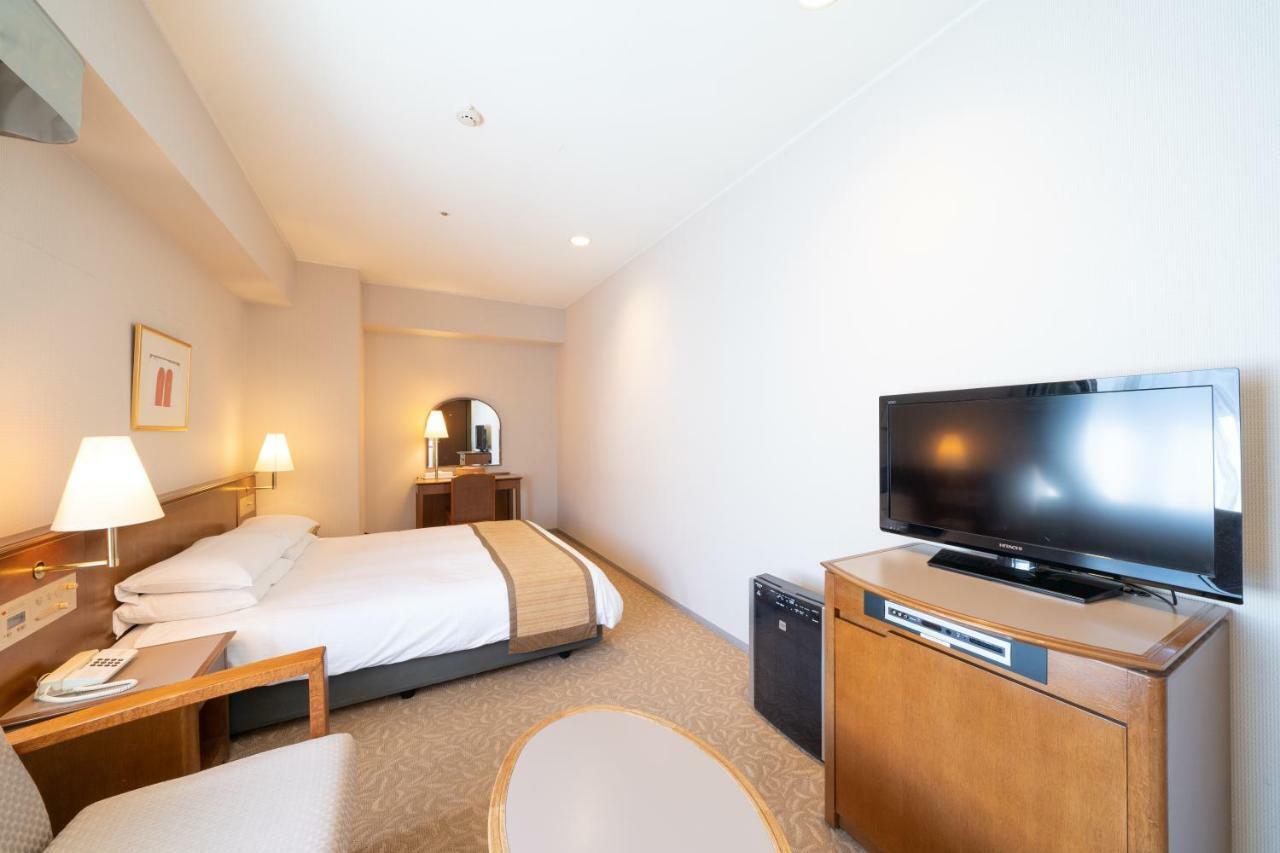 Hotel Terrace The Square Hitachi Bagian luar foto