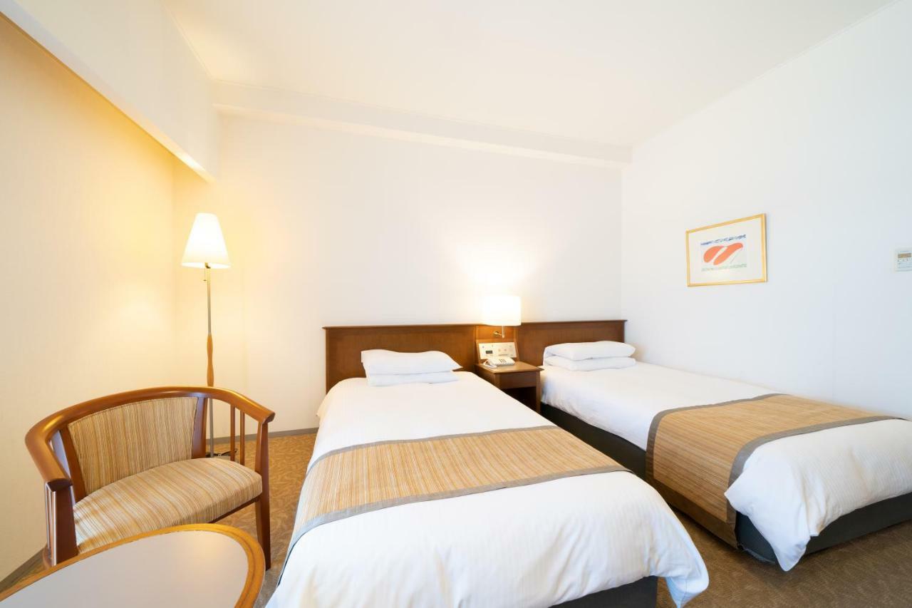 Hotel Terrace The Square Hitachi Bagian luar foto